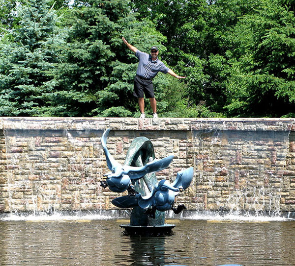 Jason Napier with Bronze Trumpeter Swans